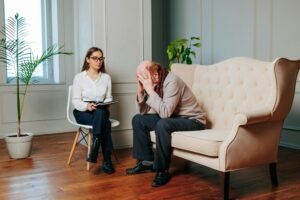 Psychologist counseling young women in office, mental health of senior peoples, Therapy